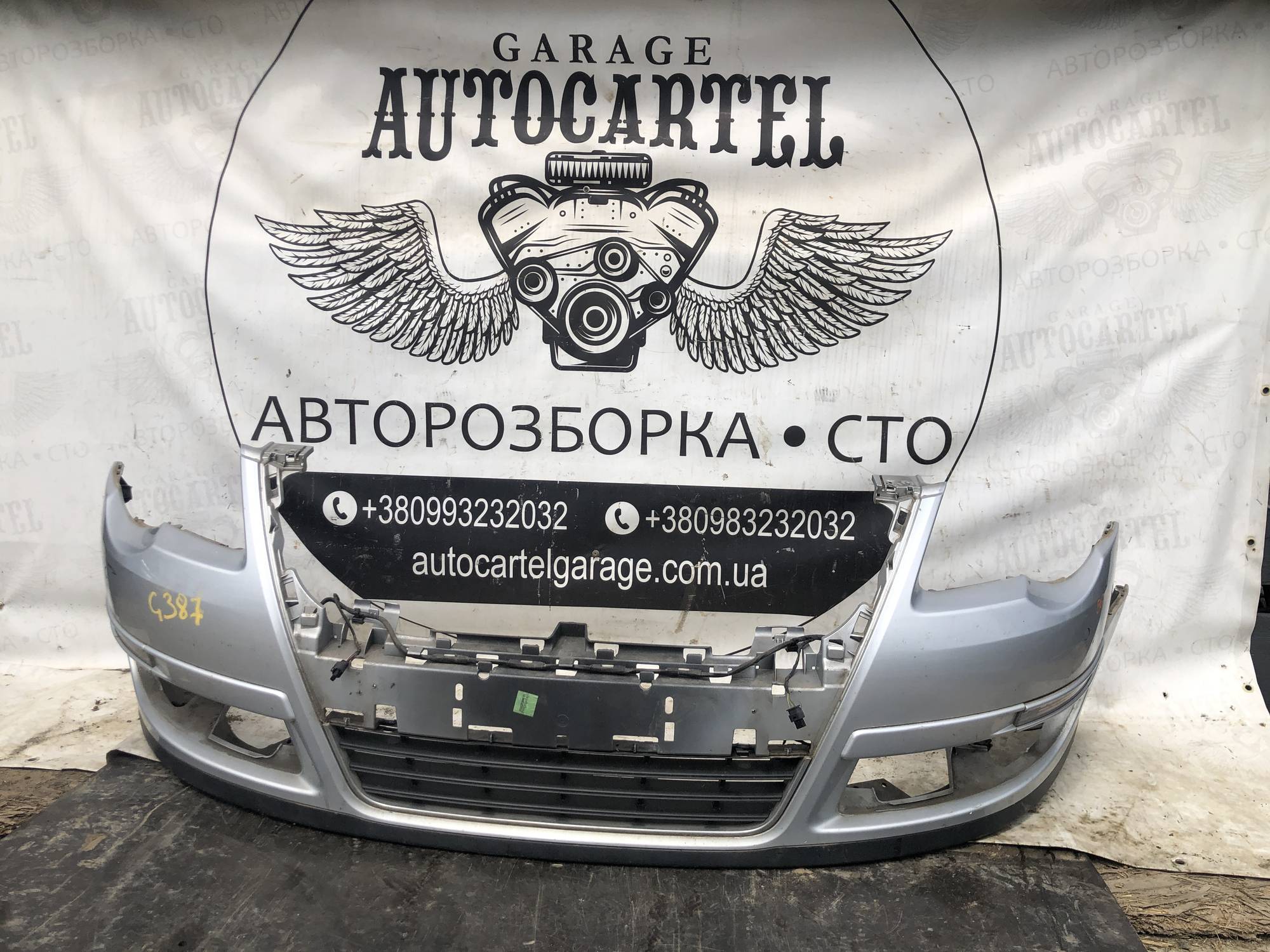 Бампер передній Volkswagen Passat B6 21110382