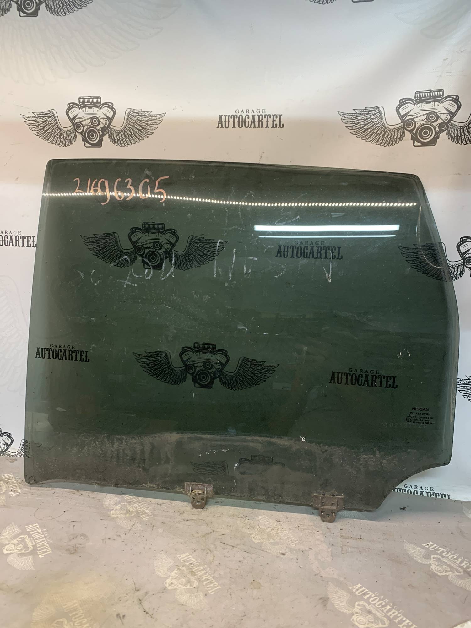 Скло дверей задньої лівої Nissan Note (E11) 2005-2013 823019U000 43r-001595