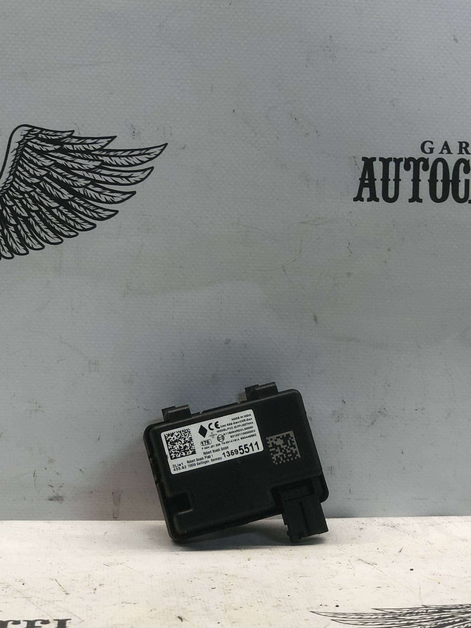 Блок управління центральним замком 13595511 Opel Astra k