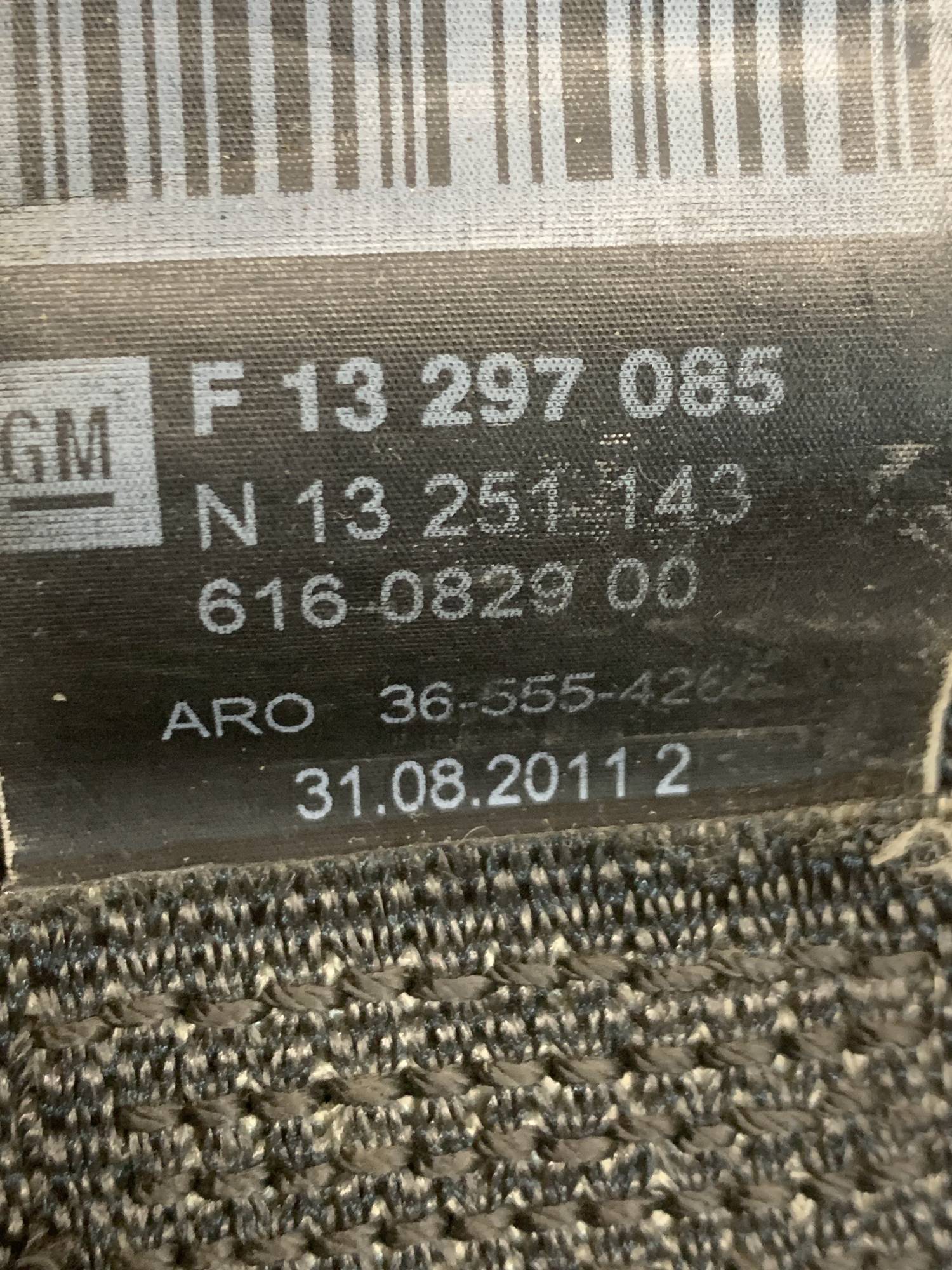 Ремінь безпеки передній лівий Opel Astra J 13297085