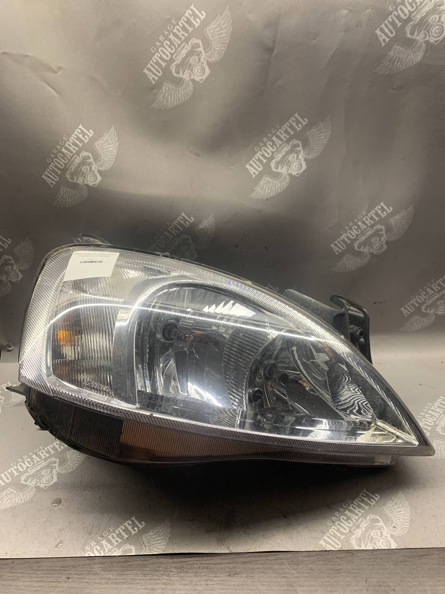 Фара передня права OPEL CORSA C 20-6065b