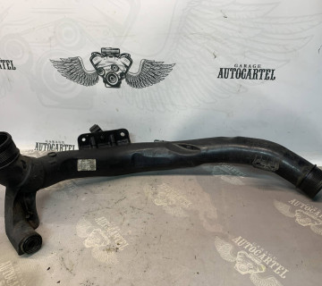 Патрубок інтеркулера лівий 1.6 - 2.0 tdi VW Caddy (04-15) / Passat B6, B7 (05-15) 1k0145840ac