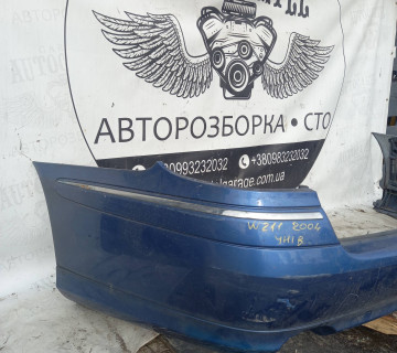 Бампер задній Mercedes W211 унів.2004 21895456