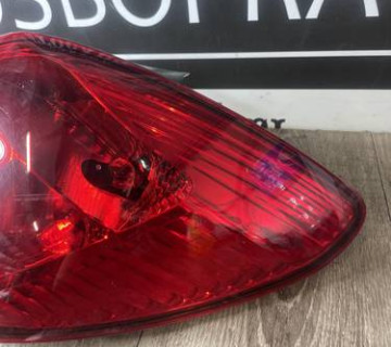 ЗАДНІЙ СТОП ПРАВИЙ OPEL CORSA D РЕСТАЙЛ 13269051