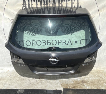 Кришка багажника задня ляда Opel Astra J 21120107